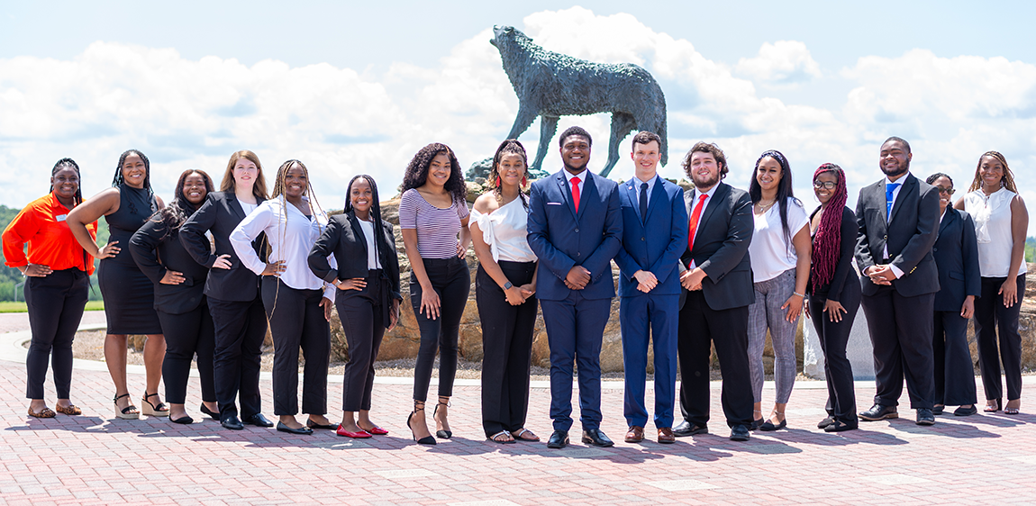 SGA students standing together in front of wolf plaza.