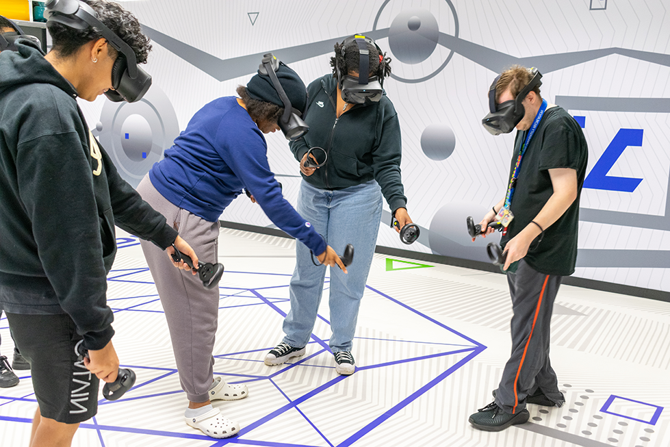 Student interacting in the Virtual Reality Arena